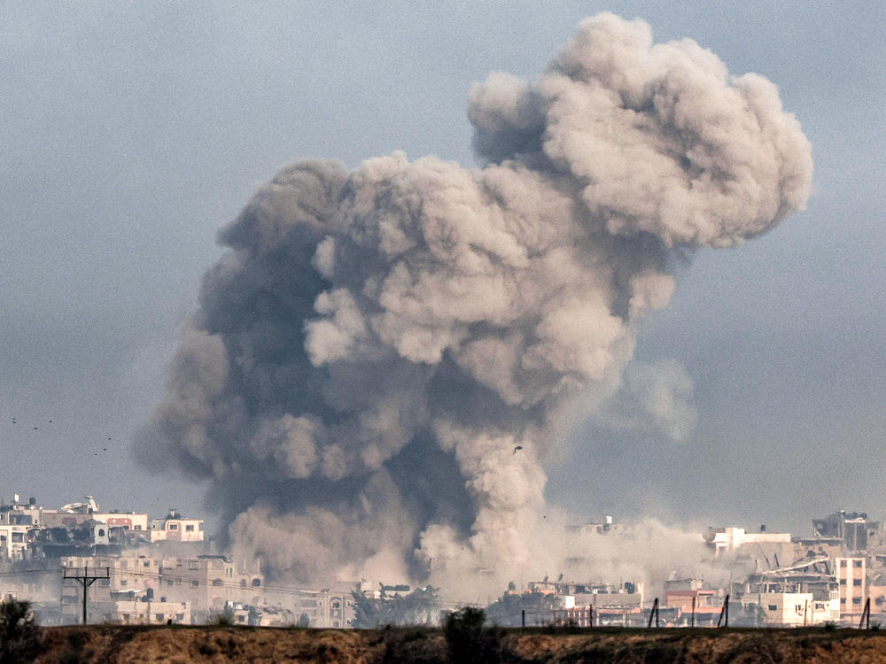 A plume smoke erupts over the northern Gaza Strip during Israeli bombardment from southern Israel on Wednesday.