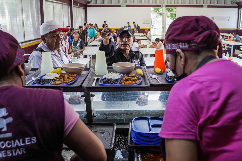 Produce donated to the city government-run Itacate program ends up on plates at one of the city's 450 soup kitchens, like this one across the road from the Central de Abastos.