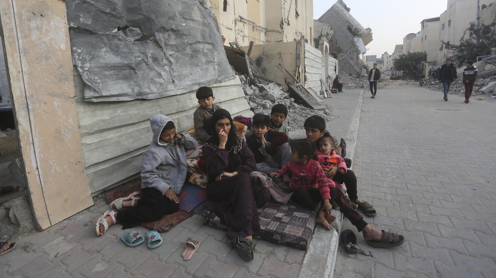 Palestinians fleeing the Israeli bombardment of the Gaza Strip arrive in Rafah on Wednesday.