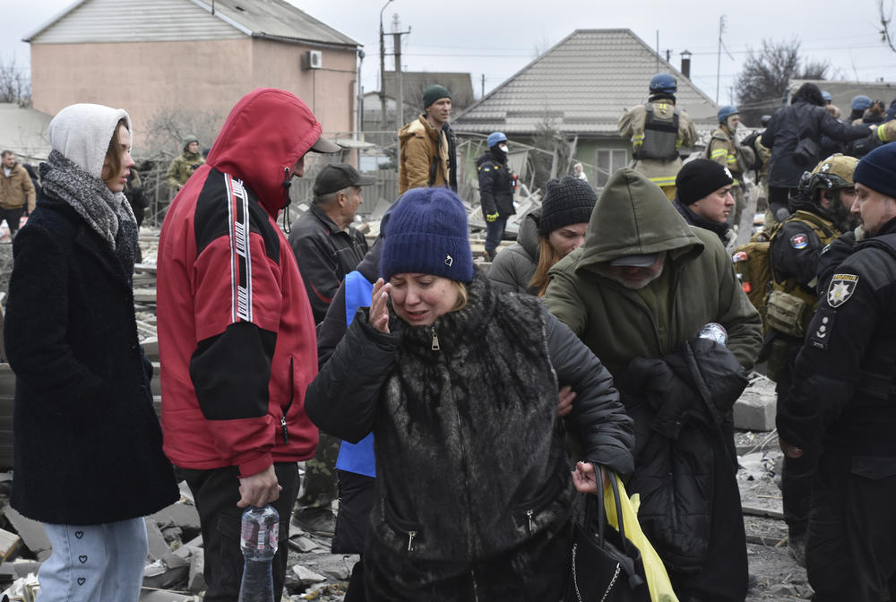 Zaporizhzhia: People react after Russia's massive air attack damaged their homes.