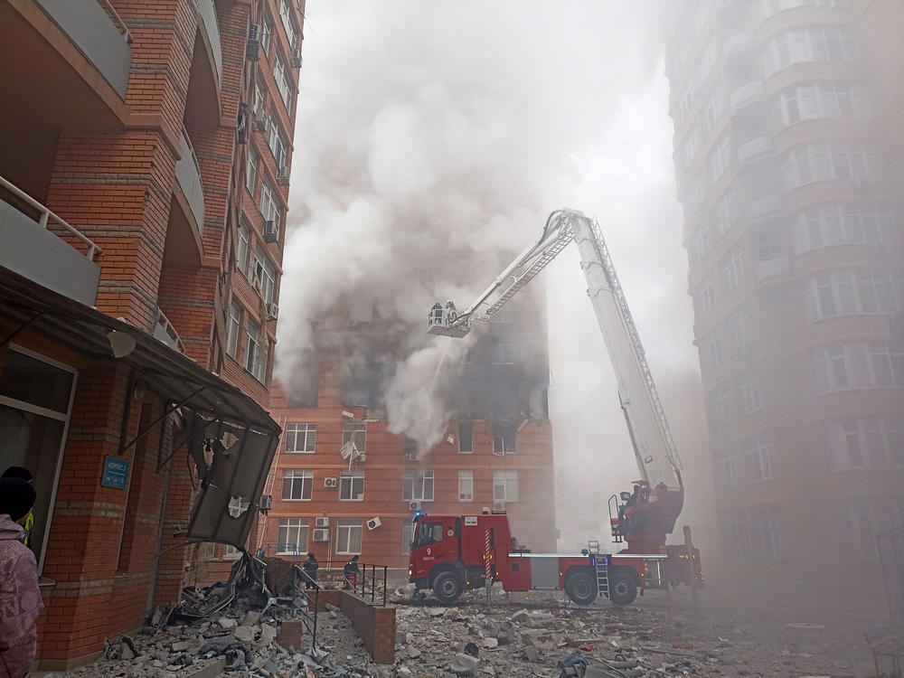 Odesa: Firefighters work to extinguish a fire at a damaged apartment building.