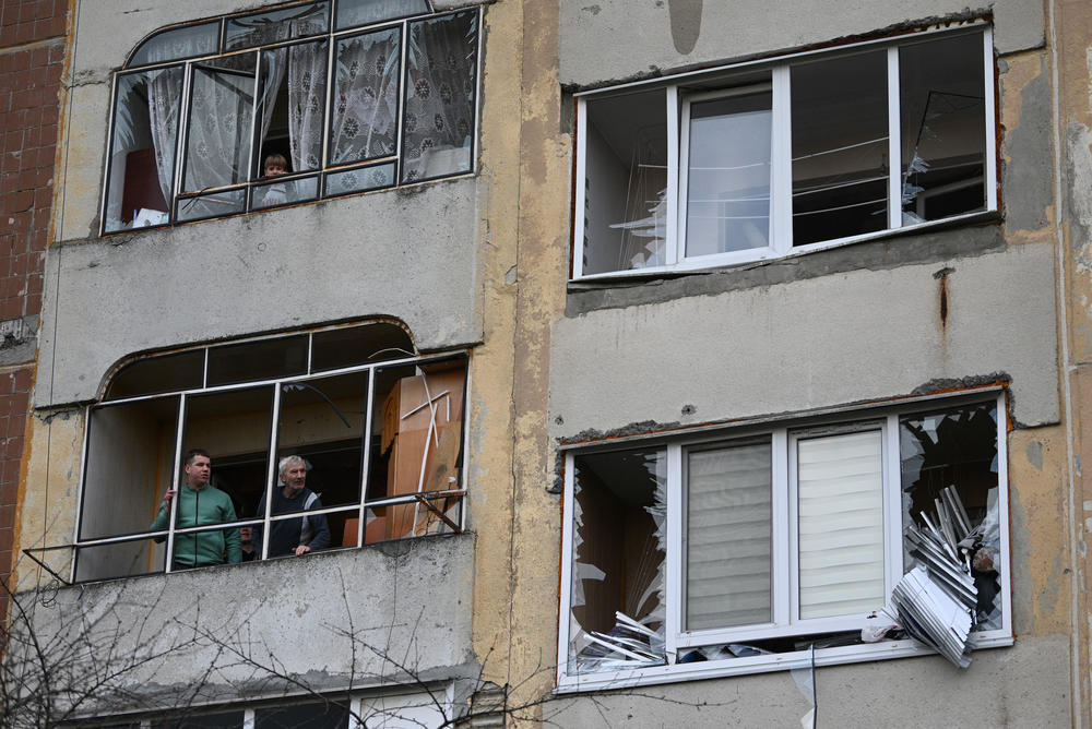 Lviv: Local residents stand inside a damaged building after a missile attack in Lviv, on December 29, 2023, amid the Russian invasion of Ukraine.
