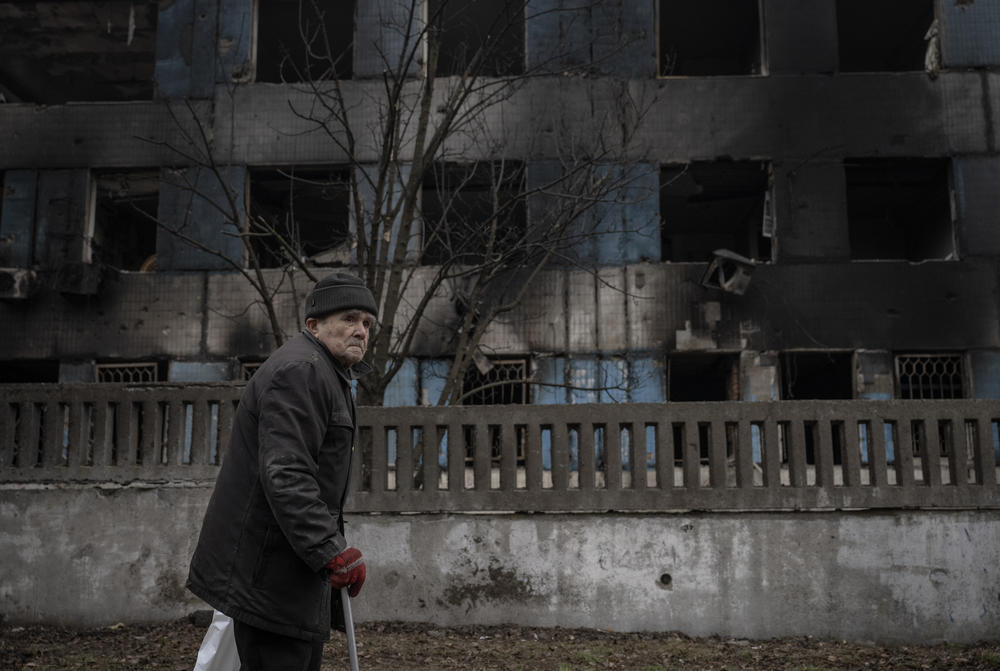 Dnipro: A man walks past a damaged building after Russian airstrikes which killed 6 and injured around 28 people.