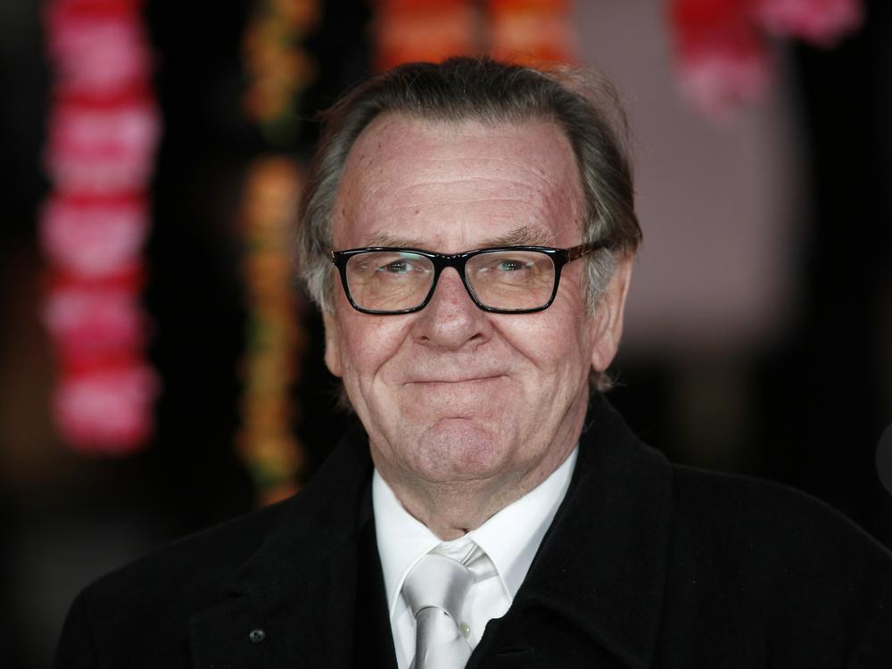 English actor Tom Wilkinson poses for photographers on the red carpet ahead of the Royal and World Premiere of the film <em>The Second Best Exotic Marigold Hotel</em> in London on Feb. 17, 2015.