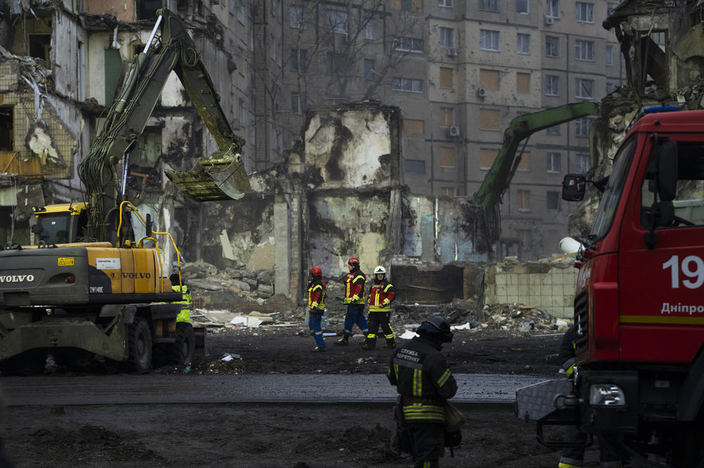 DNIPRO, UKRAINE – Crews search the rubble for people who remain missing after a Russian missile attack. <a href=