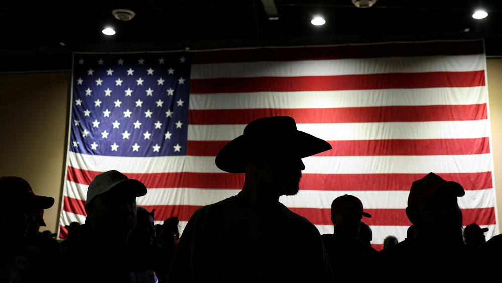 Supporters of former U.S. President Donald Trump look on before the start of a campaign rally at the Reno-Sparks Convention Center on Dec. 17 in Nevada.