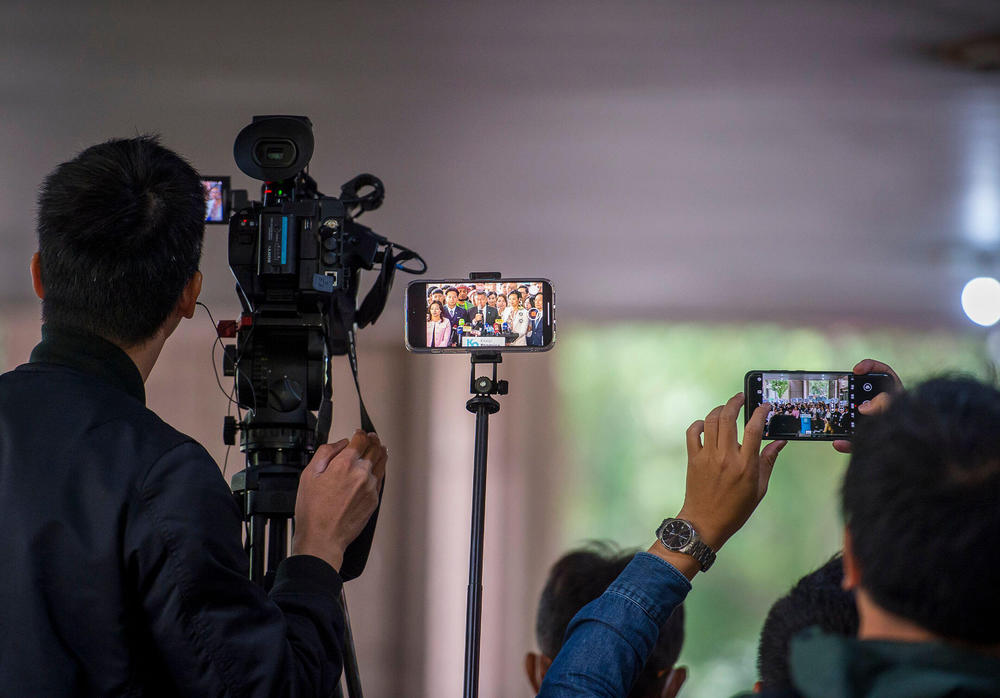 News media in Taiwan cover the arrival of presidential and vice-presidential candidates at the Central Elections Commission to register for the 2024 elections in Taipei.