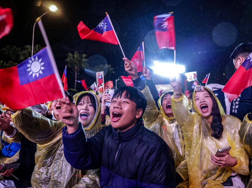 Supporters attend a campaign rally for Taiwan's main opposition party, Kuomintang, ahead of this month's presidential election, in Taipei on Dec. 23.