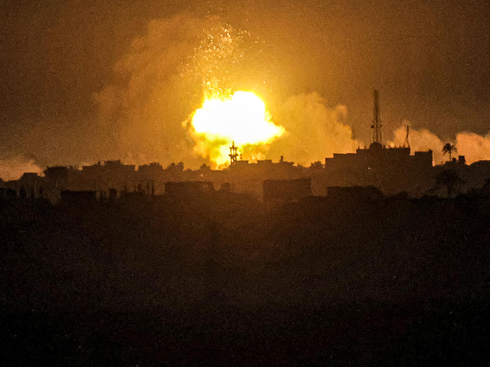 A fireball from an explosion erupts during Israeli bombardment on Khan Younis from Rafah in the southern Gaza Strip early on Wednesday.