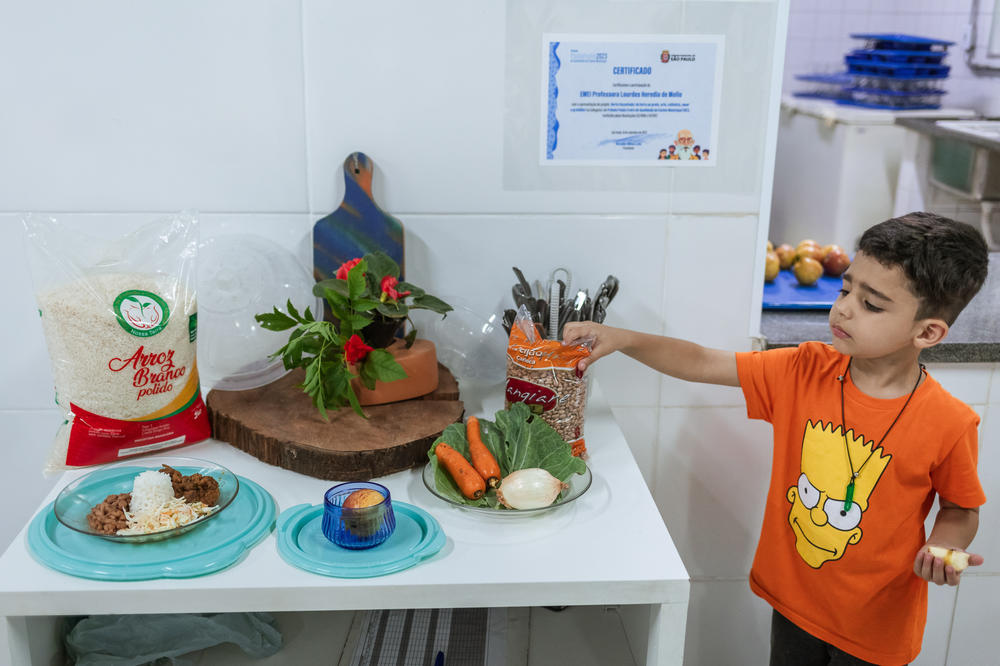 Ingredients for this day's lunch are displayed in the cafeteria.