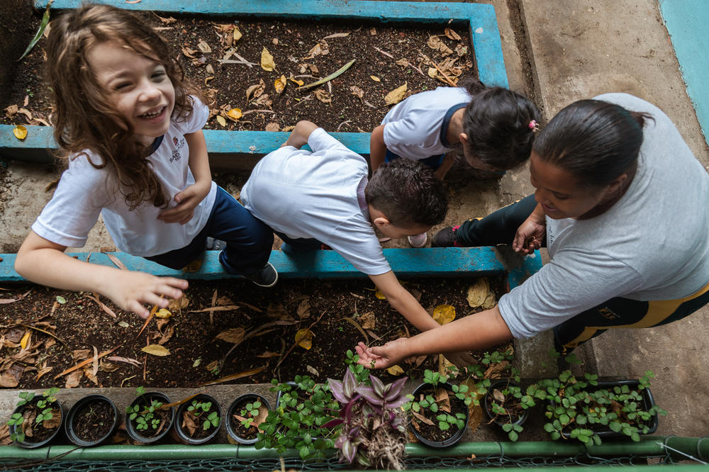 Silvia Cardoso de Oliveira (right), mother of student Davi Lucas and 