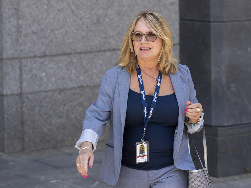 Reporter Julie K. Brown exits federal court following a bail hearing for Jeffrey Epstein in July 2019.