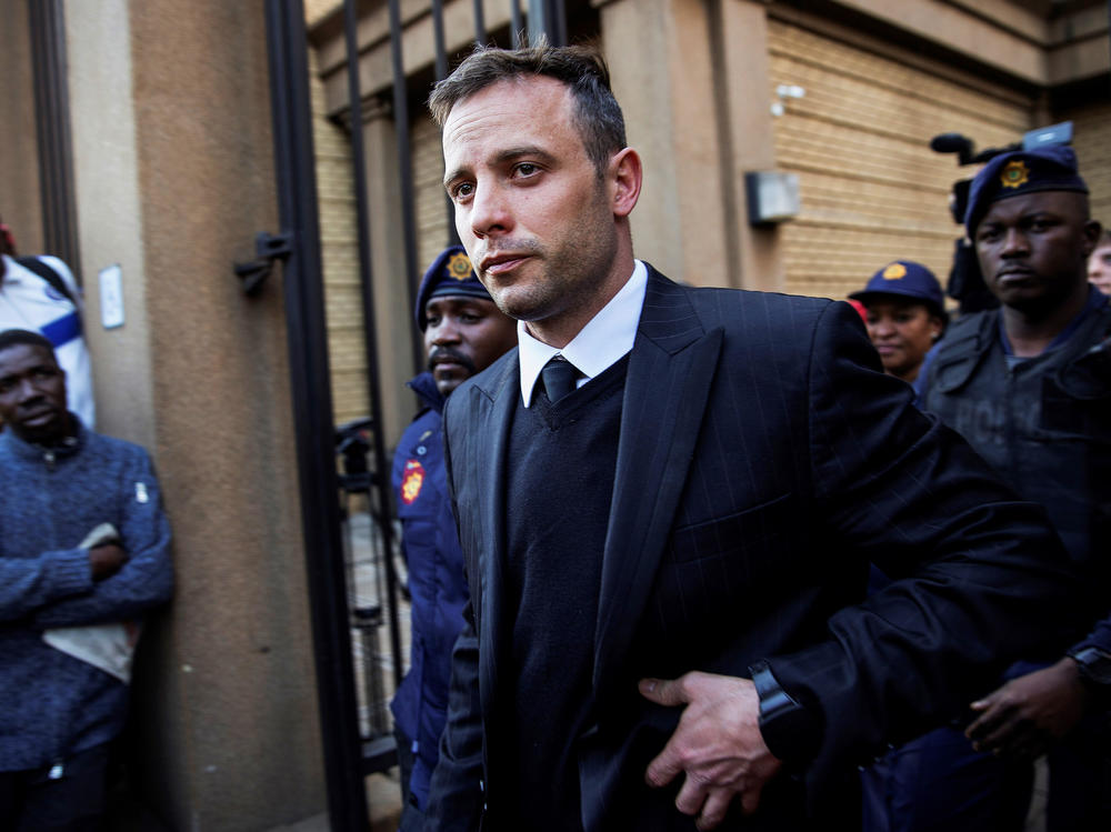 South African Paralympian Oscar Pistorius leaves the Pretoria High Court on June 15, 2016, after the third day of his resentencing hearing for the 2013 murder of his girlfriend Reeva Steenkamp. Pistorius was released from Pretoria prison on Friday after serving nearly 11 years.