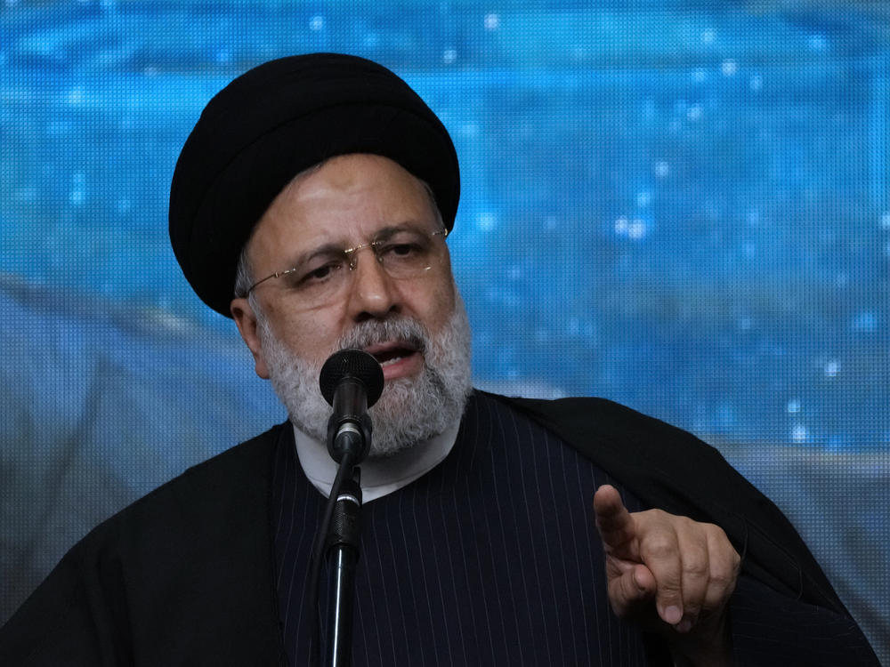 Iranian President Ebrahim Raisi speaks at a mosque in the capital Tehran on Tuesday. Iran manages a network of proxy groups throughout the Middle East that are battling U.S. and Israeli forces on multiple fronts.