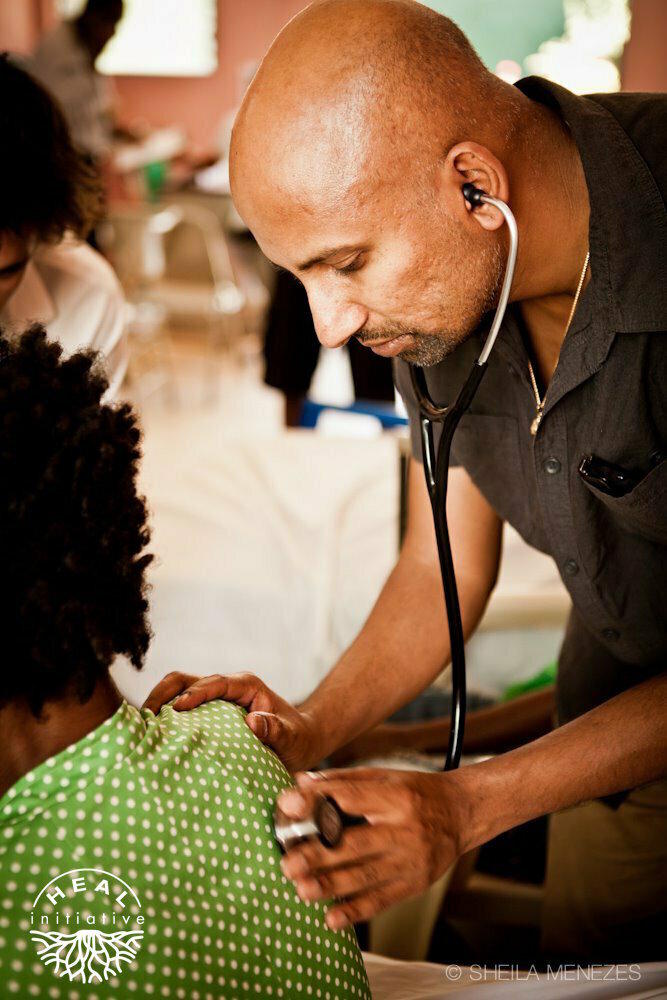 Dr. Sriram Shamasunder treating a patient in Haiti. His wish: 