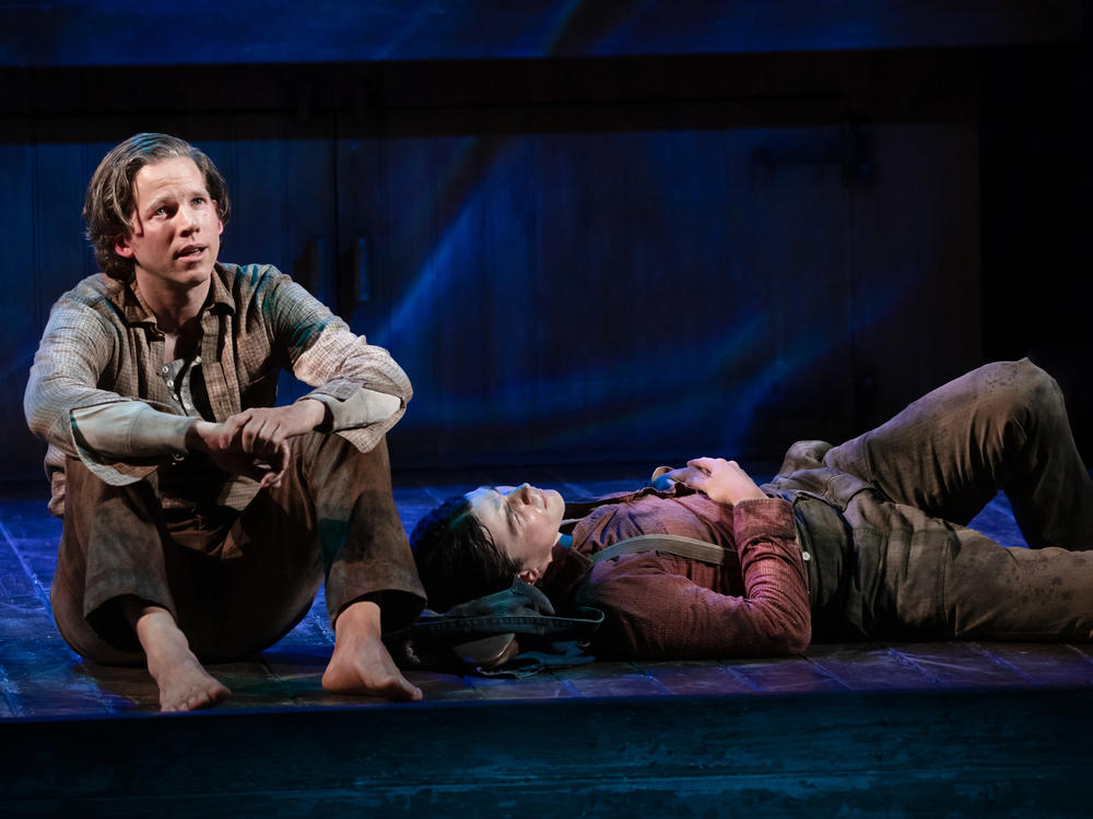 Stark Sands (L) and Adrian Blake Enscoe play brothers in Swept Away, a new musical featuring songs by the Avett Brothers.