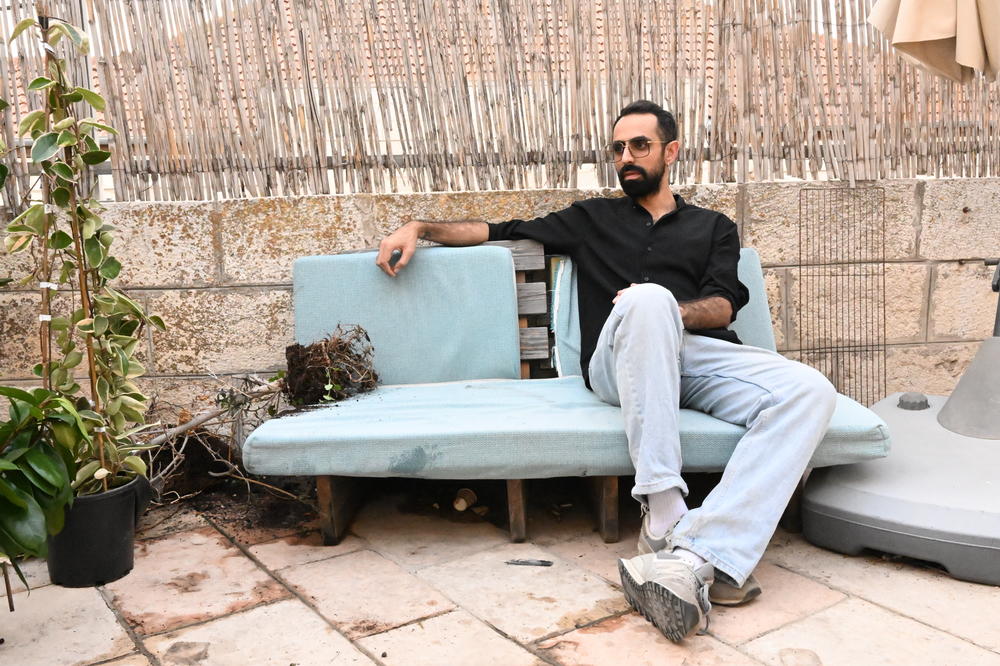 Renowned singer-songwriter Bashar Murad on his studio balcony in East Jerusalem.