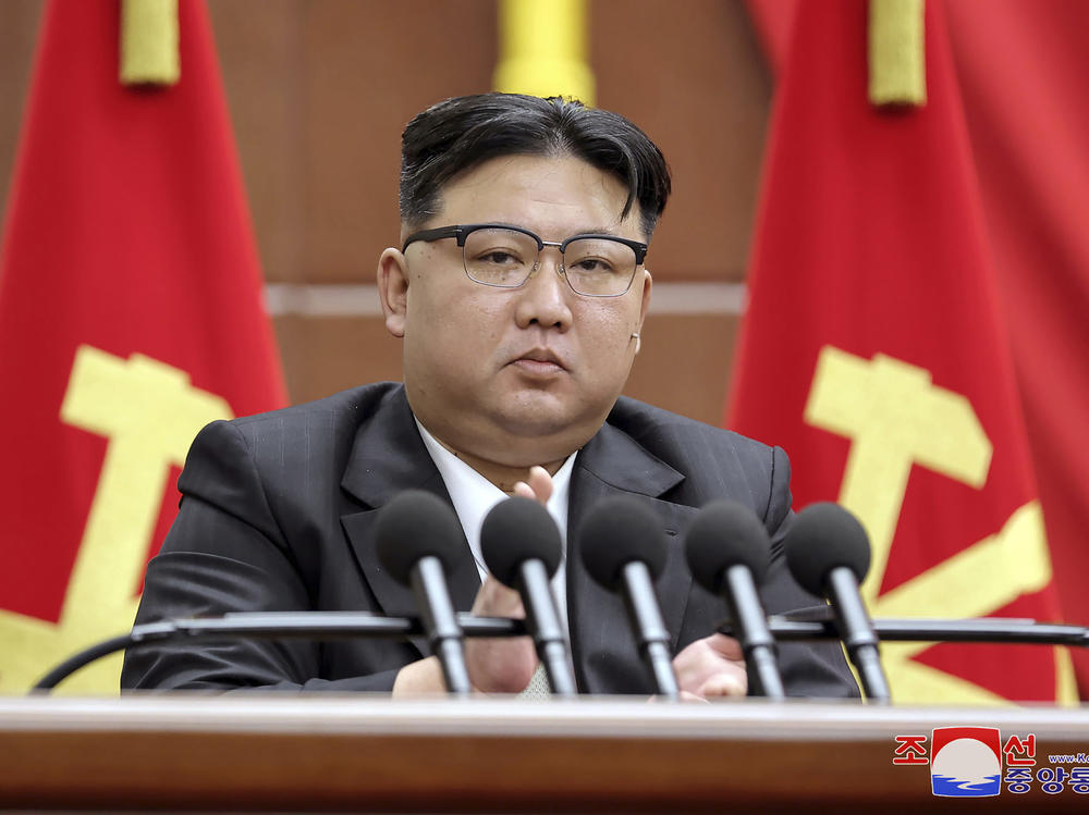 In this photo provided by the North Korean government, North Korean leader Kim Jong Un delivers a speech during a year-end plenary meeting of the ruling Workers' Party, which was held between Dec. 26 and Dec. 30 in Pyongyang, North Korea.