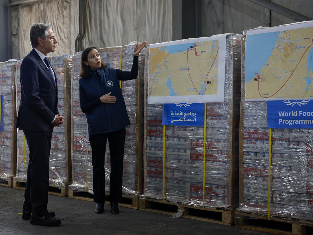 U.S. Secretary of State Antony Blinken, left, visits a World Food Program regional warehouse in Amman, Jordan, on Sunday, Jan. 7, 2024.