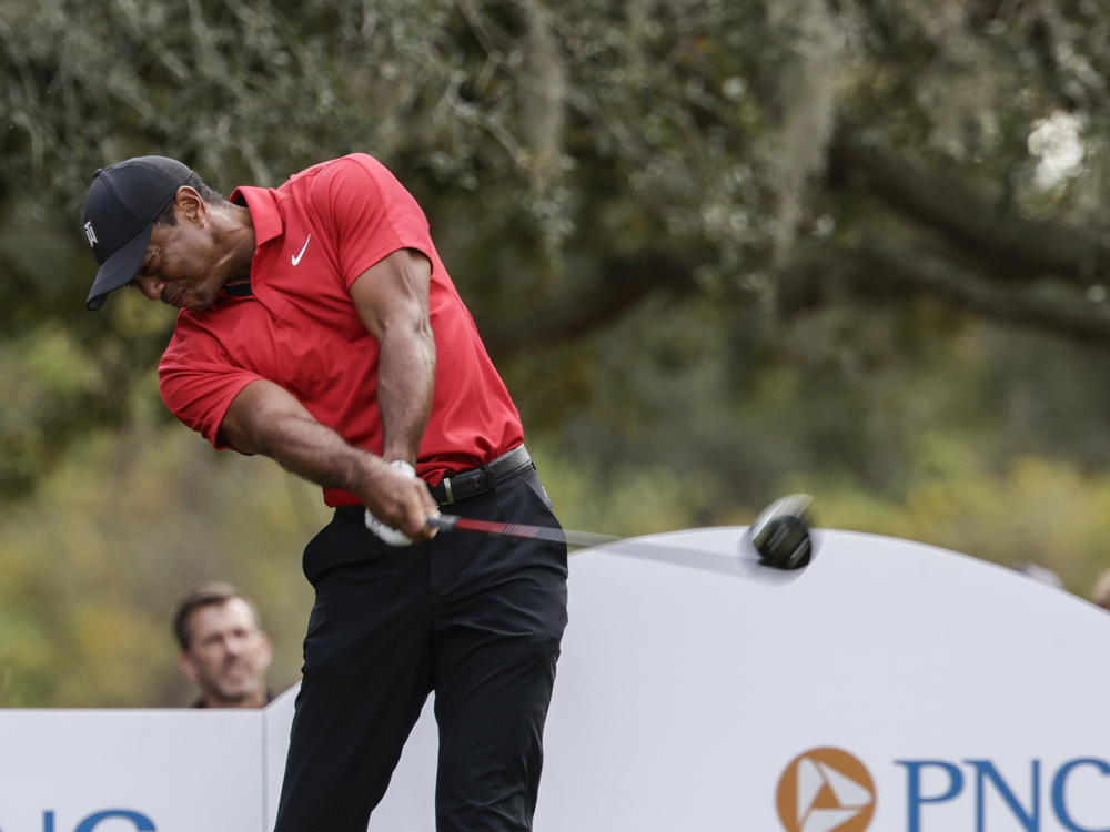 Tiger Woods tees off on the 13th hole during the final round of the PNC Championship golf tournament on Dec. 17 in Orlando, Fla.