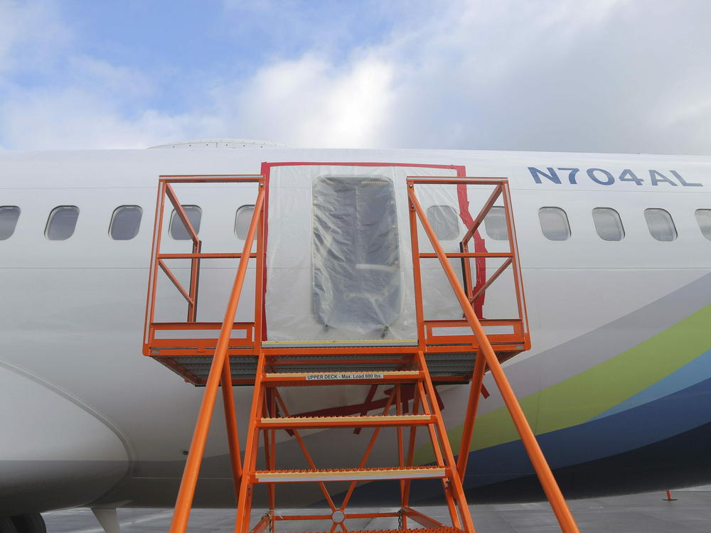 This photo shows the gaping hole where the panel used to plug an area reserved for an exit door on a Boeing 737 Max 9 jetliner blew out Jan. 5, shortly after the flight took off from Portland, Ore., forcing the plane to return to Portland International Airport.
