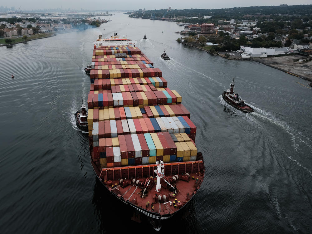 A cargo ship heads into port on Oct. 13, 2021, in Bayonne, N.J.