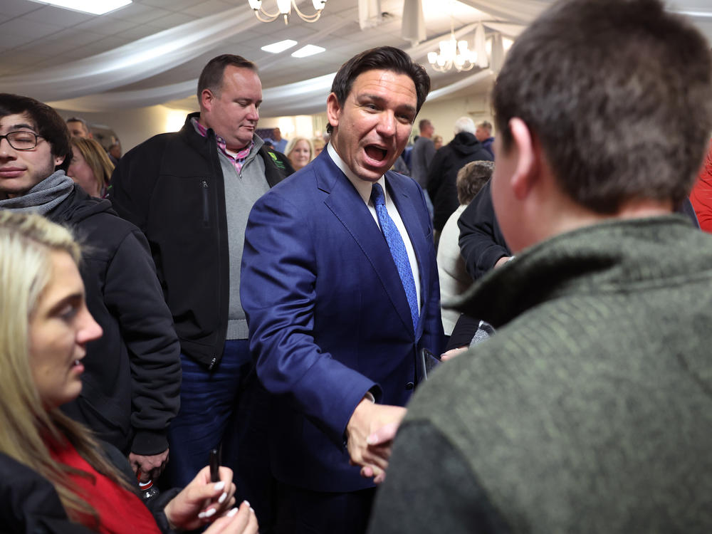 Republican presidential candidate and Florida Gov. Ron DeSantis greets guests after speaking during the Scott County Fireside Chat at the Tanglewood Hills Pavilion in Bettendorf, Iowa.
