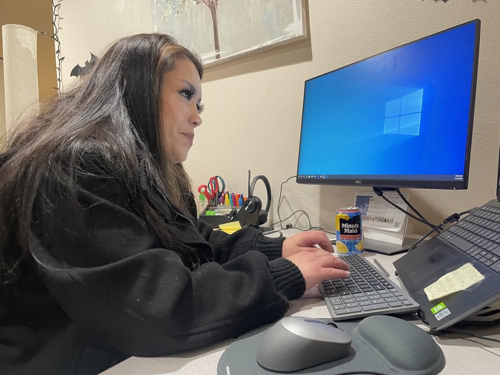 Joslyn Herrera helps clients struggling with addiction find services at the Santa Fe Recovery Center. Herrera spent her teenage years struggling with opioid addiction, and says her many stints in juvenile detention did nothing to help her recovery.