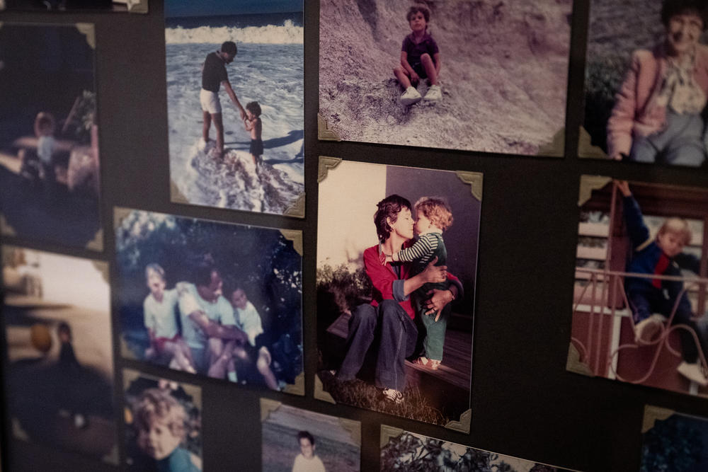 Photos of Kay James and her son Michael Bishop hang on the wall of her home in Moraga on Jan. 9, 2024. Bishop died jumping off of the Golden Gate Bridge in 2011.