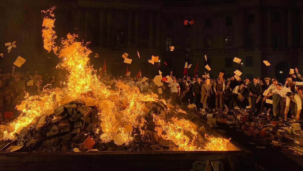 The book burning scene in <em>Origin</em> was filmed in a square in Berlin in which the Nazis burned books in 1933.<strong> </strong>