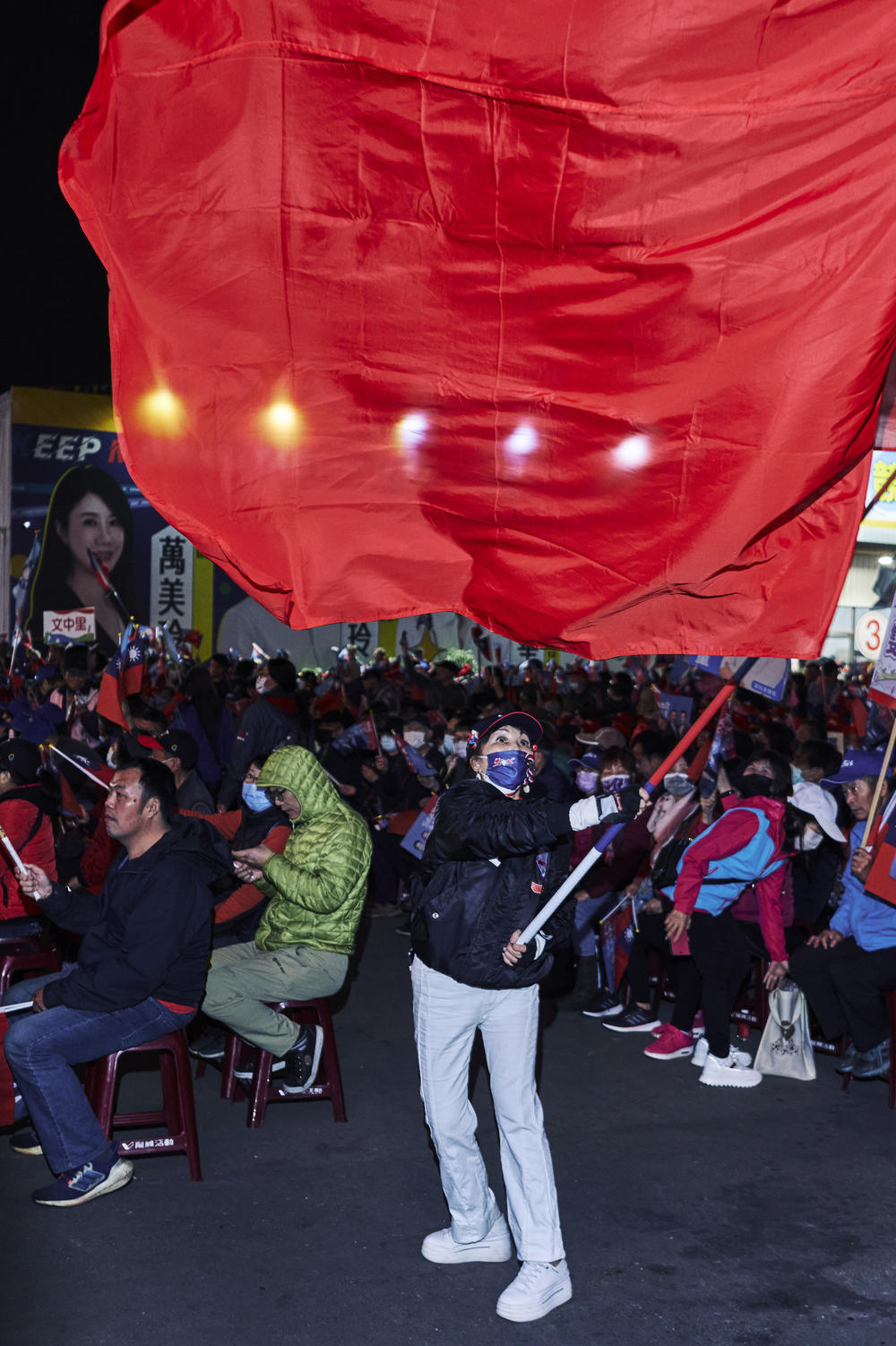 Big flags and big feelings are on display at a KMT rally.