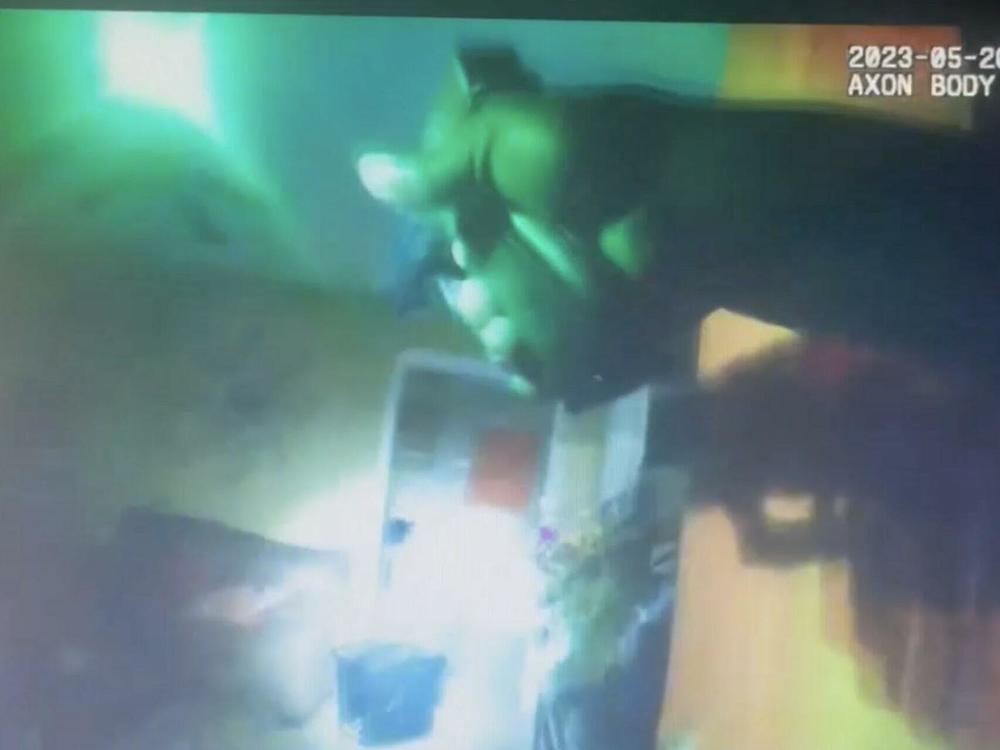 Copies of the 911 calls placed by 11-year-old Aderrien Murry and his grandmother to the Indianola Police Department were released Friday. The calls raise questions about the May 20, 2023, incident and how the situation was handled by authorities. Here, an image from the body camera footage shows the moment Sgt. Greg Capers fired his weapon at Aderrien.