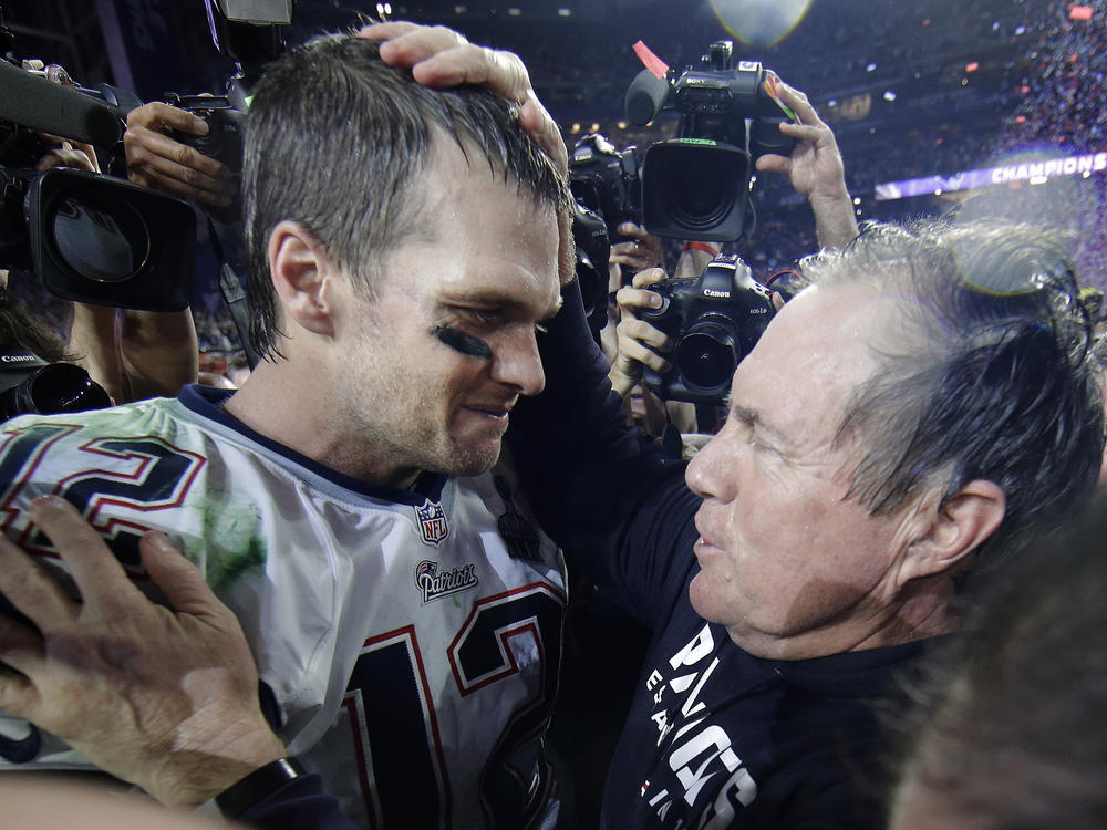 New England Patriots quarterback Tom Brady celebrates with head coach Bill Belichick after winning Super Bowl XLIX against the Seattle Seahawks in 2015.