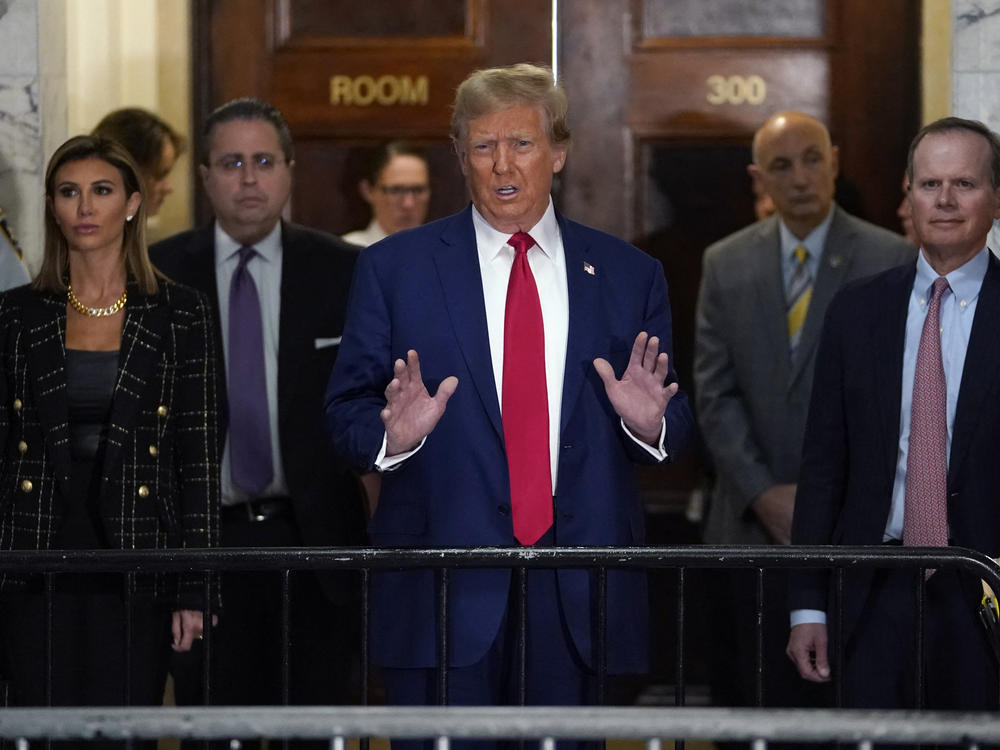 Former President Donald Trump speaks to members of the media as he arrives at the New York State Supreme Court during the civil fraud trial against the Trump Organization in New York City on Jan. 11, 2024.