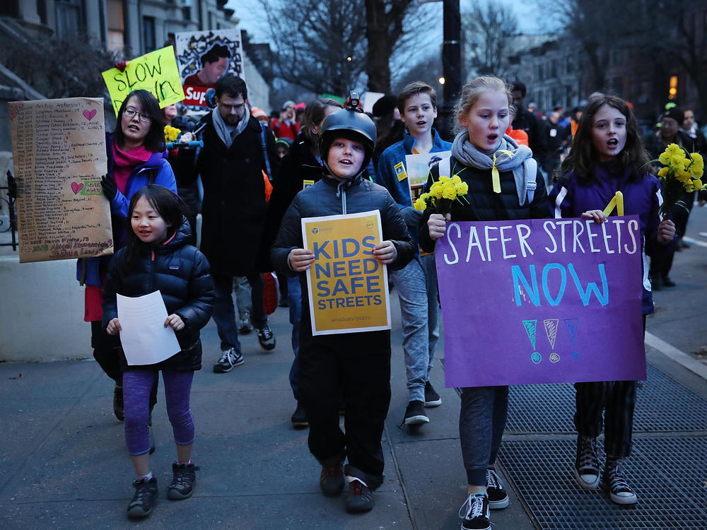 Hundreds of residents, children, activists and politicians attend a March for Safe Streets following an accident in which two small children were killed by a car driver on March 12, 2018, in the Brooklyn borough of New York City.