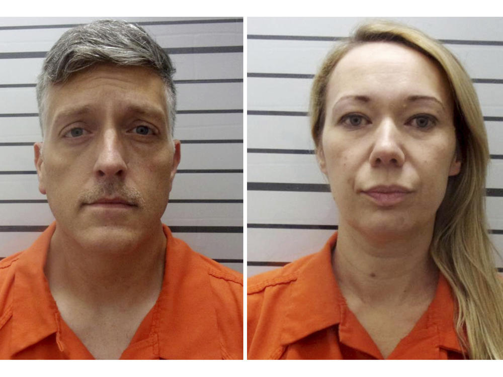 Booking photos provided by the Muskogee County, Okla., Sheriff's Office shows Jon Hallford and Carie Hallford, owners of Return to Nature Funeral Home, a Colorado funeral home where 190 decaying bodies were found.