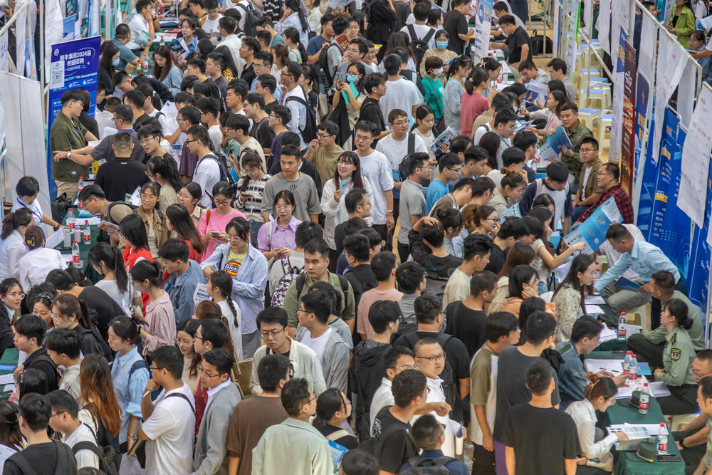 Students attend a job fair for graduates at Zhengzhou University on September 22, 2023 in Zhengzhou, Henan Province of China.