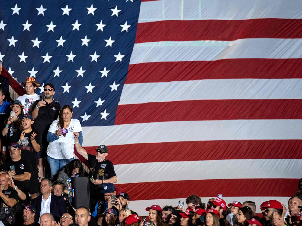 Former President and 2024 Republican presidential hopeful Donald Trump's supporters attend a rally at Ted Hendricks Stadium in Hialeah, Fla., on Nov. 8, 2023.