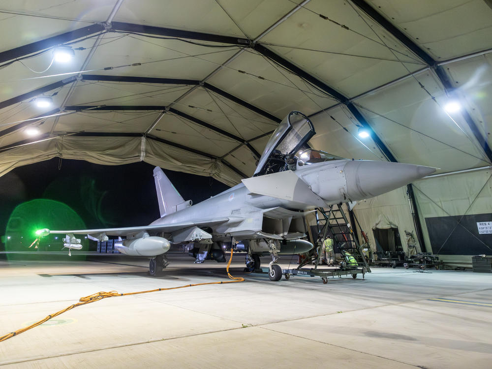 In this handout image provided by the U.K. Ministry of Defence, an RAF Typhoon aircraft returns to berth following a strike mission on Yemen's Houthi rebels at RAF Akrotiri on Friday in Akrotiri, Cyprus.