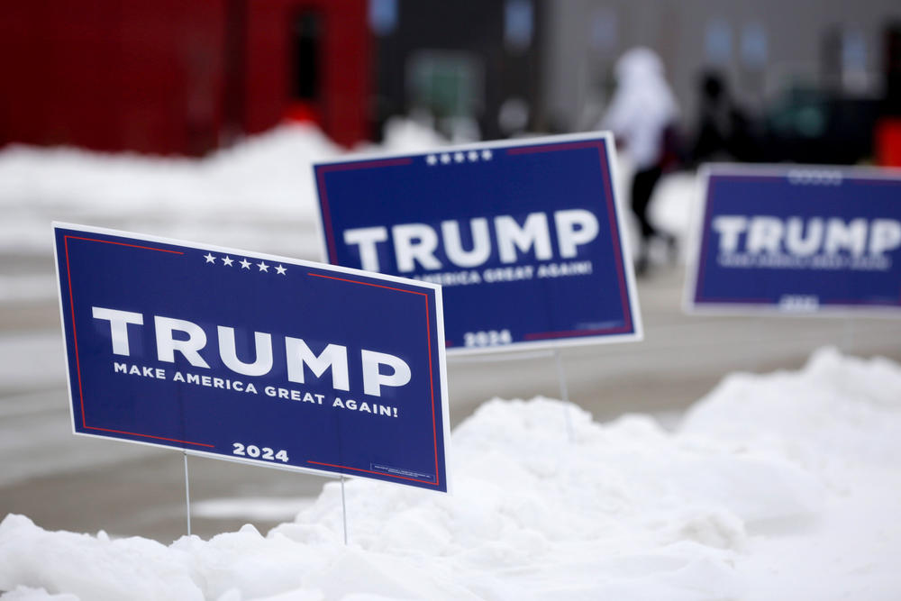 A campaign sign for Republican presidential candidate Donald Trump in the Iowa snow on Jan. 15, 2024.