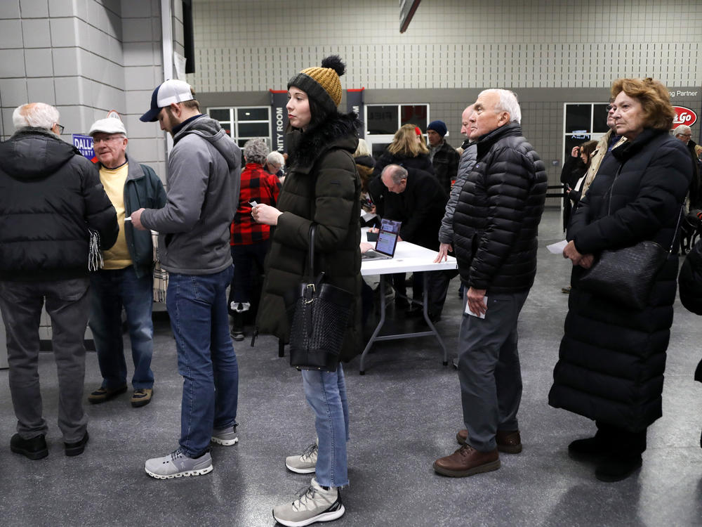 Voters waiting in line at the West Des Moines caucus site on Jan. 15, 2024.
