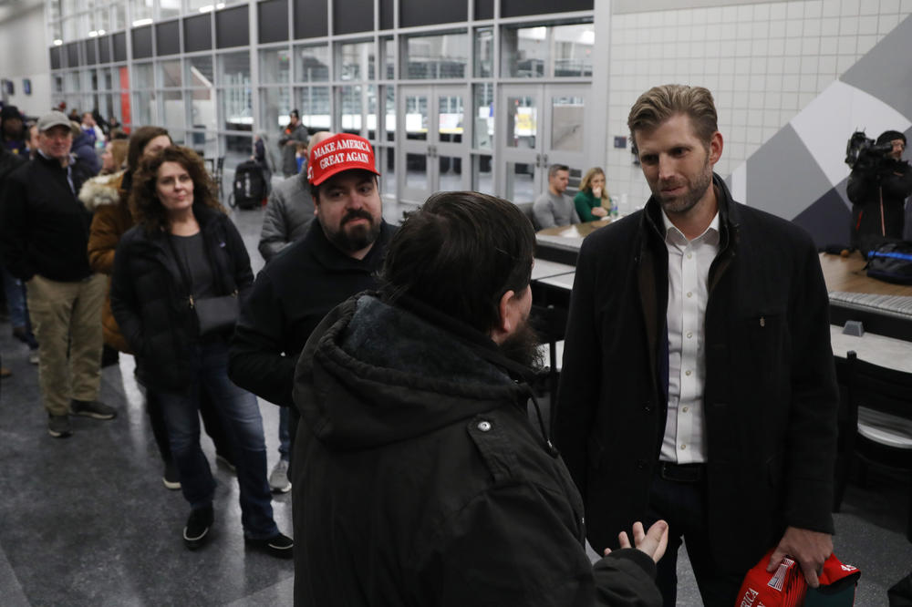 Voters at the West Des Moines caucus site meet and speak to Eric Trump on Jan. 15, 2024.