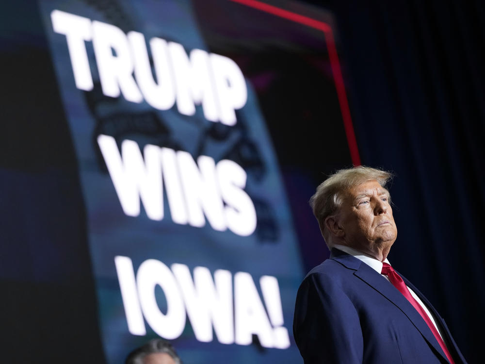 Republican presidential candidate former President Donald Trump speaks at a caucus night party in Des Moines, Iowa on Monday.