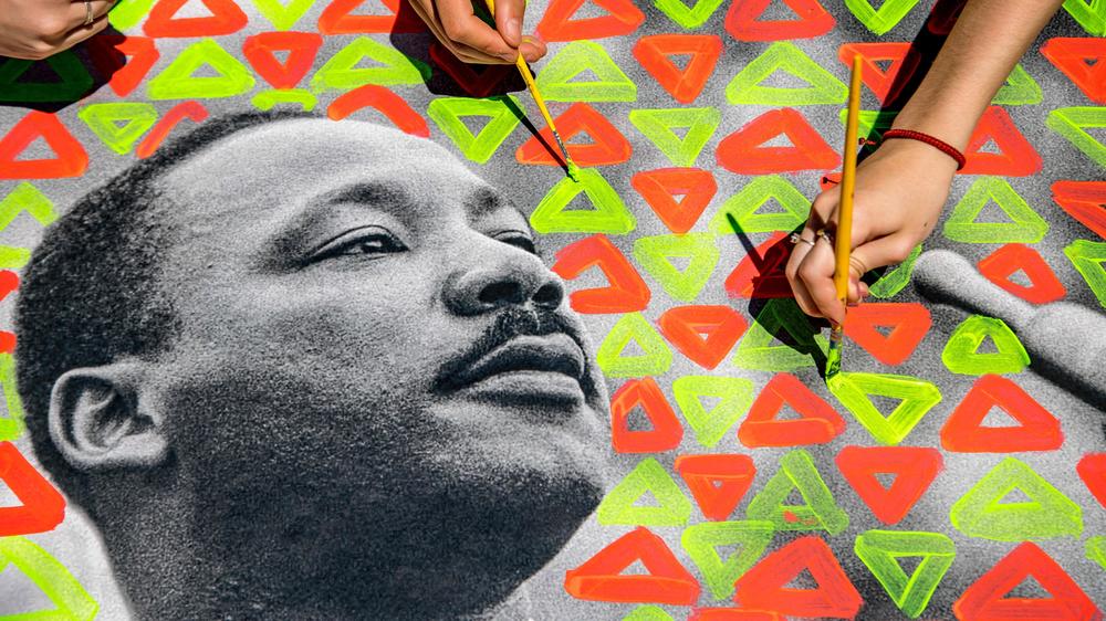Students from municipal schools in Caxias do Sul, a city with a majority white population in the state of Rio Grande do Sul, Brazil, paint an image of US civil rights leader Martin Luther King Jr., as they participate in a program called 