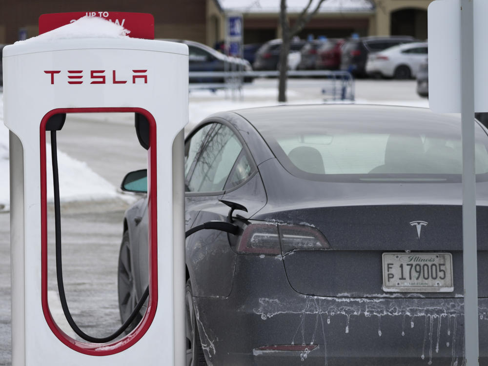 Tesla owners in Chicago say the intense cold is making it difficult to charge their vehicles. Here, a Tesla is seen at a Supercharger in Rolling Meadows, Ill., last January.