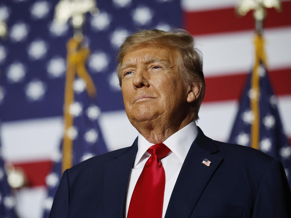 Former President Donald Trump speaks at his caucus night event at the Iowa Events Center on January 15, 2024 in Des Moines, Iowa.