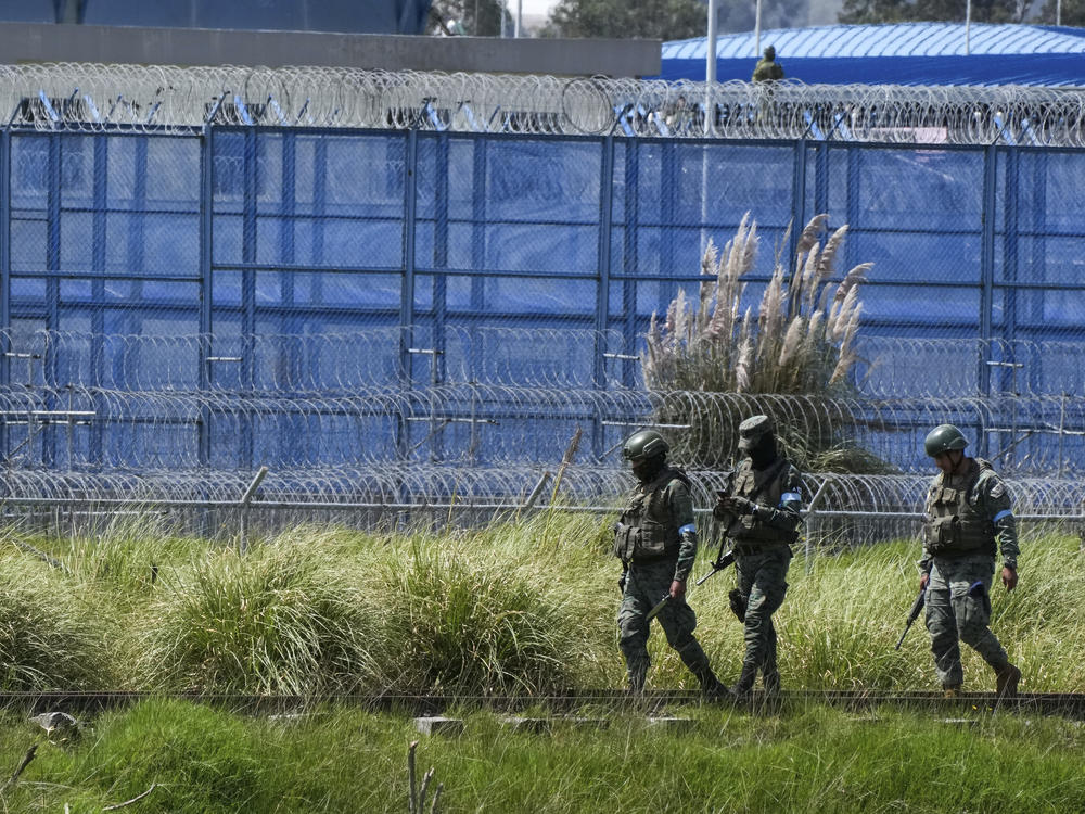 Soldiers enter the prison in Cotopaxi, Ecuador, on Sunday, Jan. 14, 2024. Soldiers and police intervened in several prisons in Ecuador in search of weapons, ammunition and explosives and to restore order.