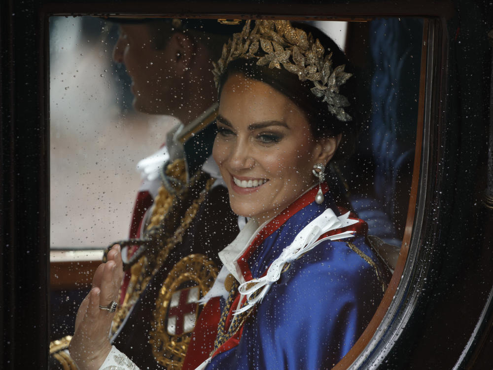 Kate, Princess of Wales, and Prince William travel in a coach following the coronation ceremony of Britain's King Charles III in London, on May 6, 2023. The Princess of Wales has been hospitalized for planned abdominal surgery and will remain at The London Clinic for up to two weeks, Kensington Palace said Wednesday.