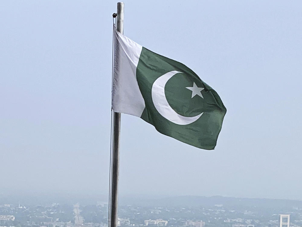 A Pakistani flag flies on a lookout in Islamabad, Pakistan, on July 27, 2022.