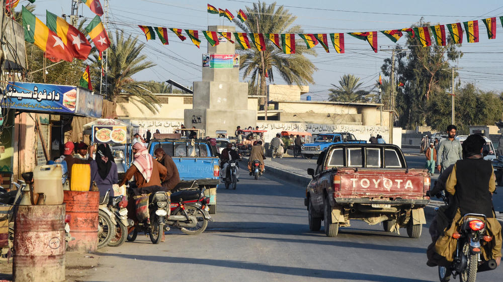 Commuters ride along a street at Panjgur district in Balochistan province on Jan. 17. Pakistan recalled its ambassador from Iran on Jan. 17, and blocked Tehran's envoy from returning to Islamabad after an Iranian air strike killed two children in the west of the country on Jan. 16.